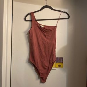 One shoulder pink bodysuit